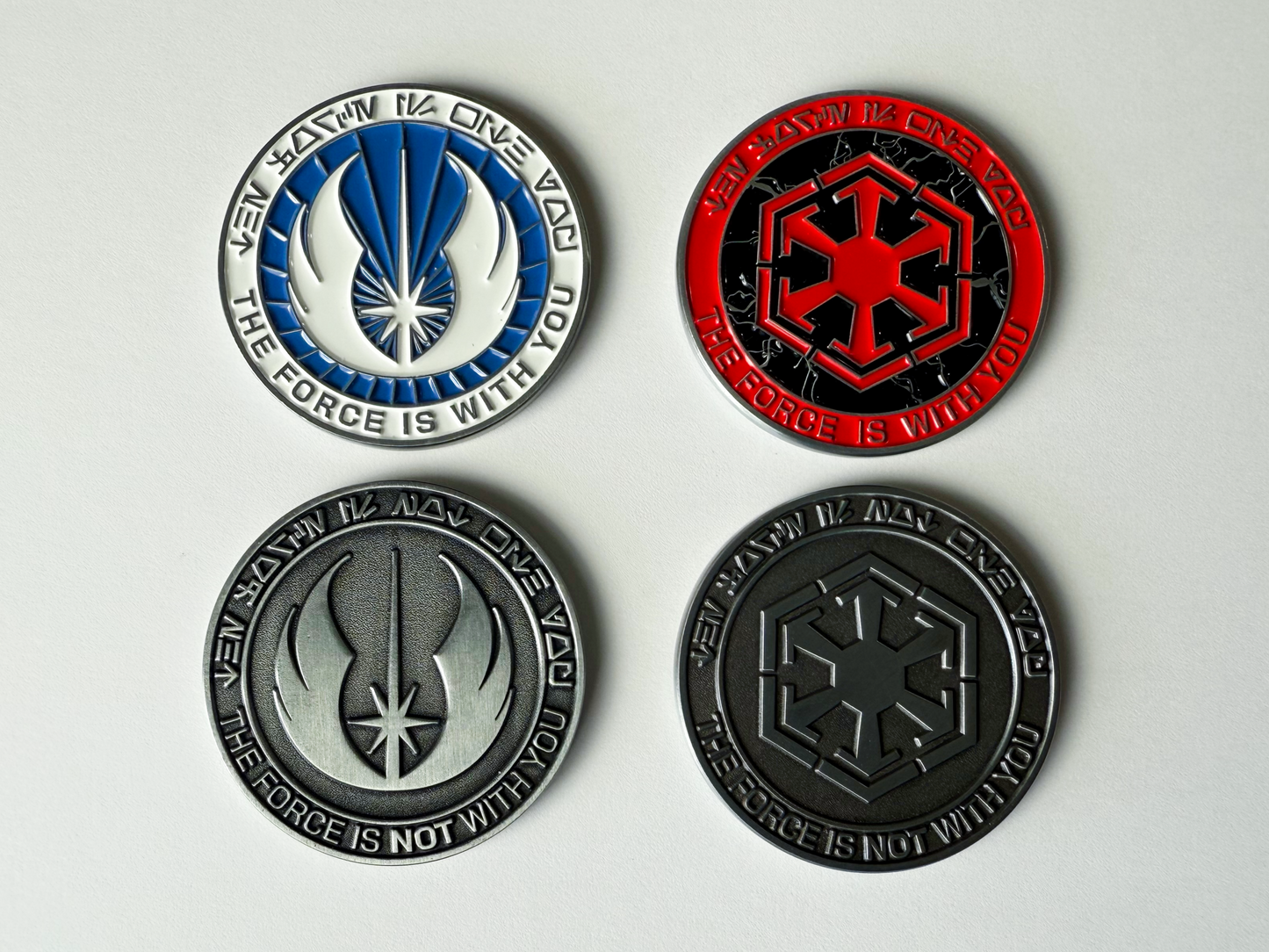 dark and light force tokens showing the front and back